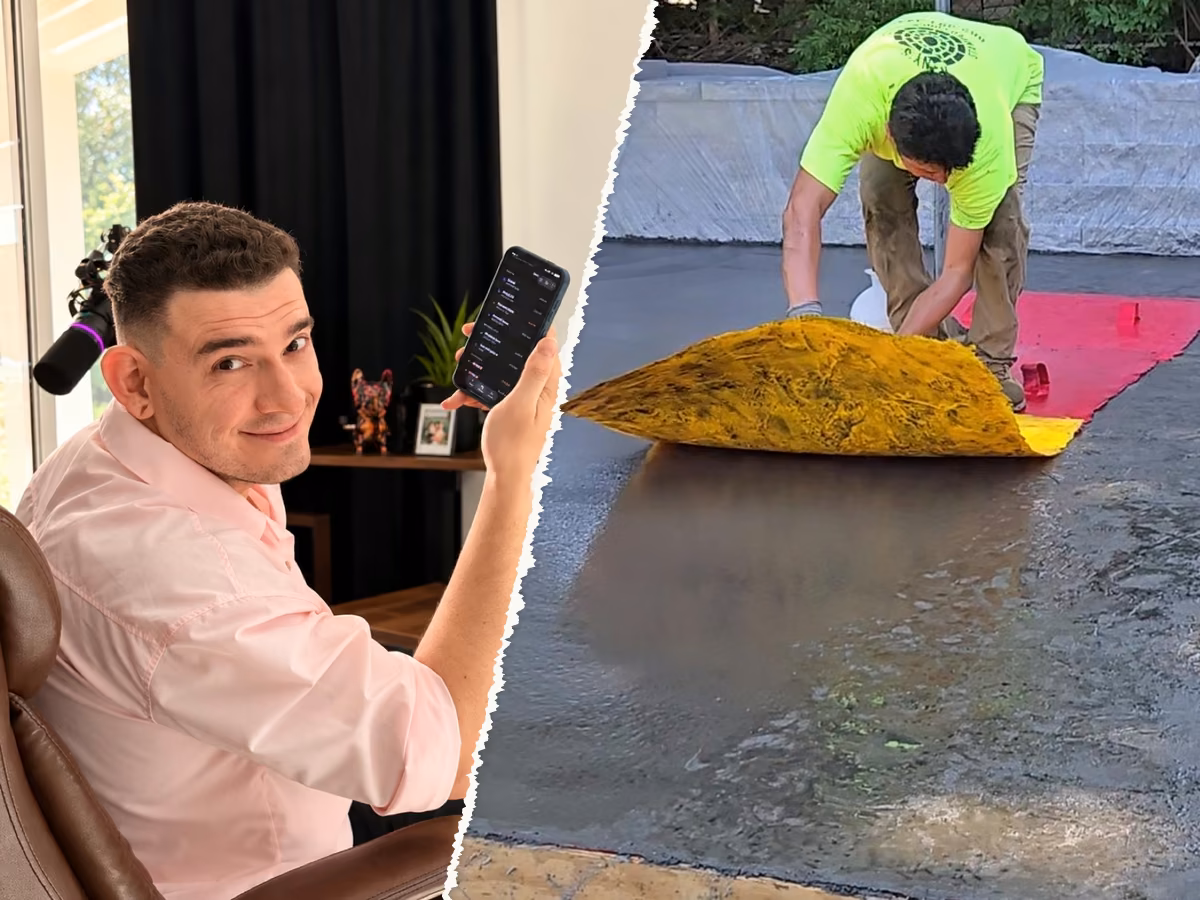 Eddie A. holding up his phone next to a worker lifting a stamp mat off freshly stamped concrete
